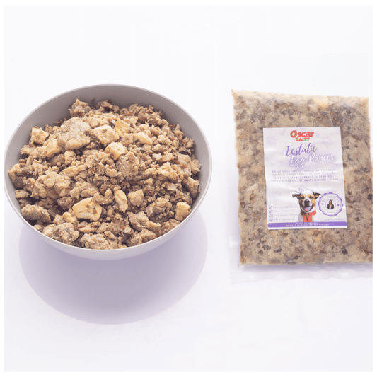 Oscar Daisy dog food egg paneer in a bowl and package with a label on a white background