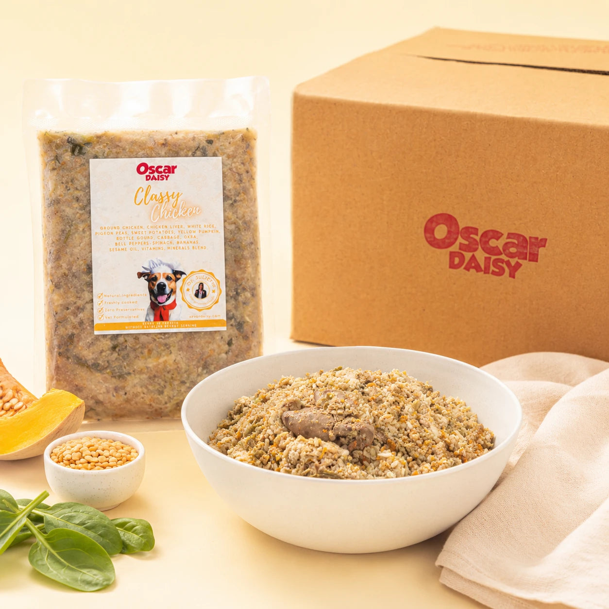 Oscar Daisy pet food packaging with a bowl of food, packaging, and ingredients on a light background