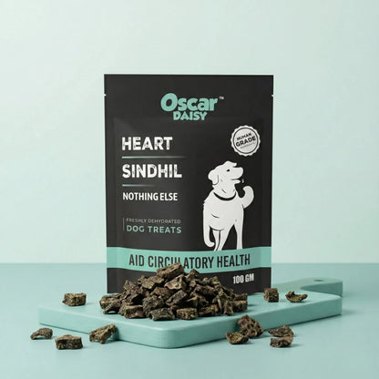 Oscar Daisy dog treats packaging with treats on a light blue background