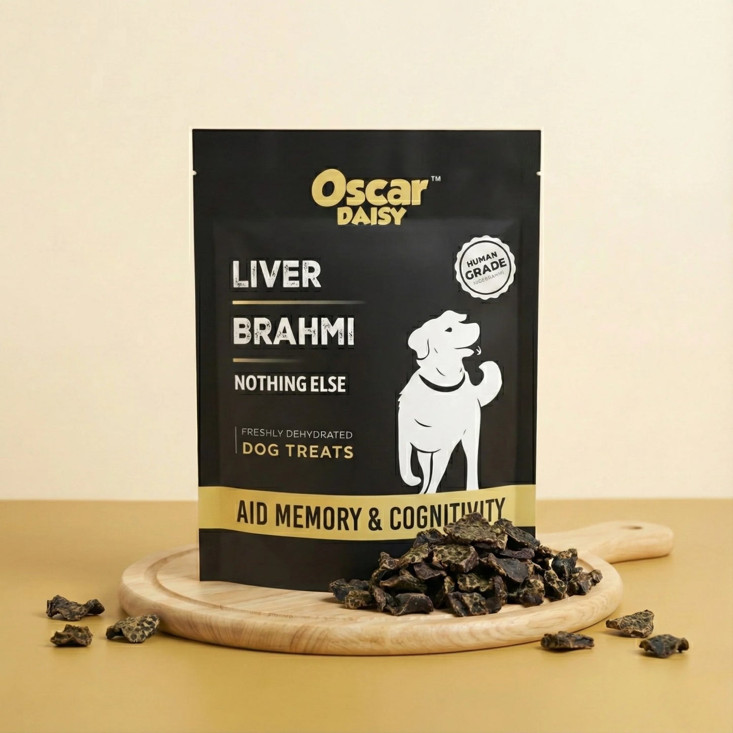 Oscar Daisy dog treat package with treats on a wooden board