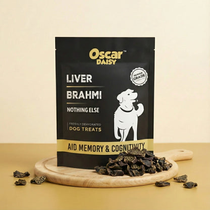 Oscar Daisy dog treat package with treats on a wooden board
