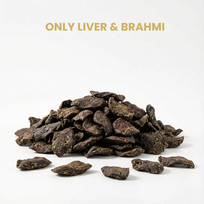Heap of dark brown dog treats labeled 'Only Liver & Brahmi' on a white background